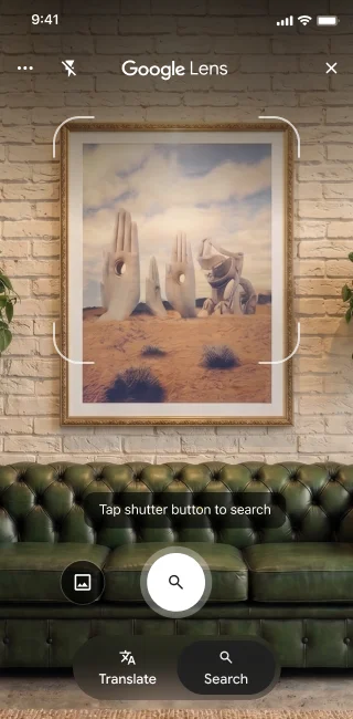 On a phone, the Google Lens app is open. A notification indicates the user can tap the shutter button to search an image of large stone hand sculptures in a desert.